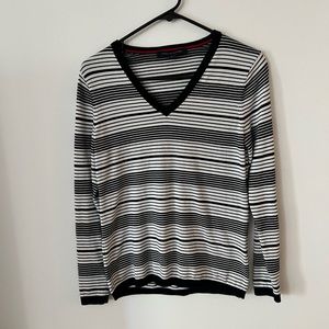 Tommy cute and comfy. Black and white. Size small.